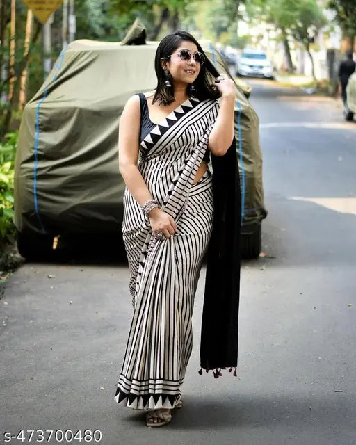 CREAM SAREE WITH BLACK BINDI SAREE