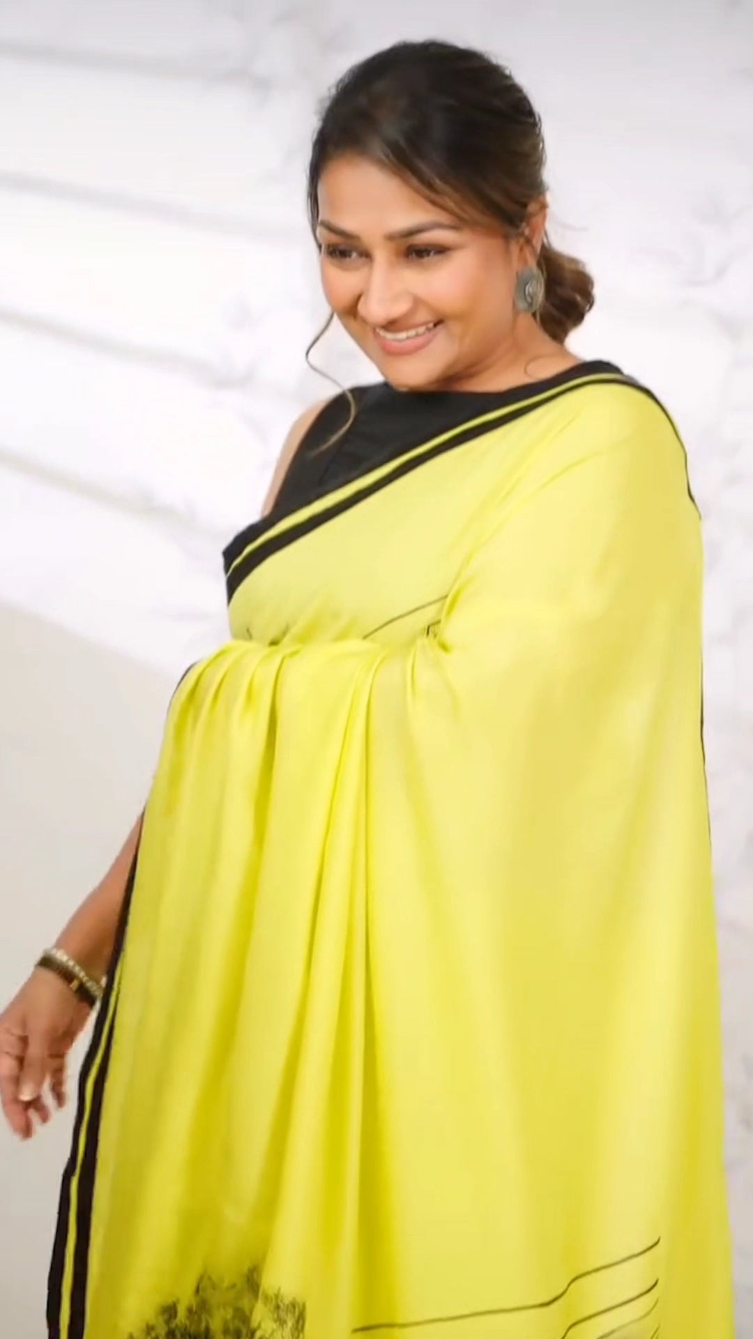CELEBRITY WEAR LIME YELLOW COLOR NATURE PRINTED SAREE.